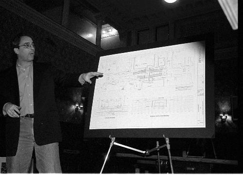 TOM MURRAY, project manager for the Harvard Center for Government and International Studies, presents the plan for a tunnel under Cambridge St.  at last night’s public hearing at City Hall
