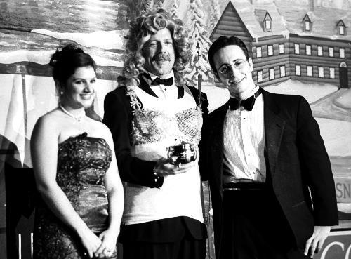 Hasty Pudding Theatricals co-producers LENA DEMASHKIEH ’03 and JOSHUA N. BRESS ’03, who served as hosts of the Man of the Year event, pose with BRUCE WILLIS, this year's honoree.