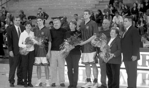 Seniors are honored in a ceremony before the men's basketball game.