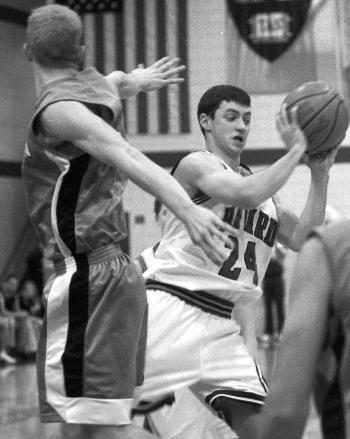 Patrick Harvey plays in last Saturday's men's basketball game.