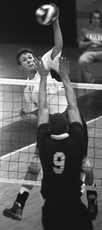 RUSS MOSIER swats a kill against Vassar Saturday.