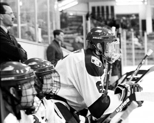 Freshman ROB FLYNN readies to hop over the boards for a line change.