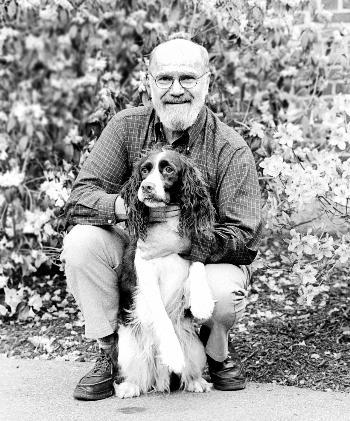 Winthrop House Master PAUL D. HANSON reunited with his dog Huck, who had earlier run away during yesterday’s May Day celebration.