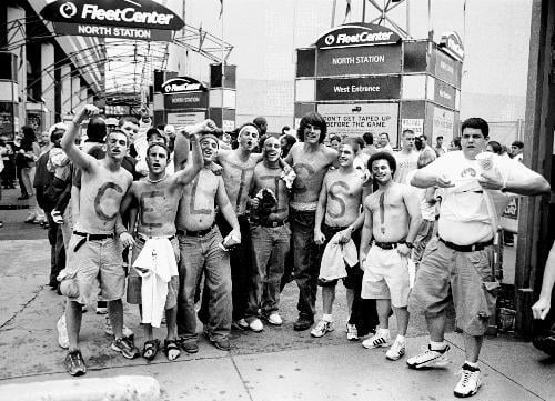 Enthusiastic Celtics fans congregated outside of the North Station T stop on Friday before entering the Fleet Center. The Celtics lost to the New Jersey Nets 96-88, eliminating the Celtics from the NBA playoffs.