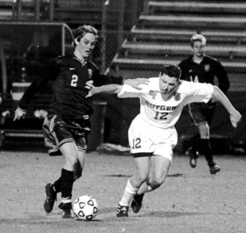 MIKE LOBACH, seen here in the Crimson’s first-round NCAA match with Rutgers, led a Harvard defense that posted six straight shutouts during the season.