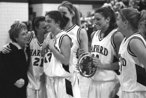 From left, Coach KATHY DELANEY-SMITH and the Harvard seniors—LAURA BARNARD, JENN MONTI, LINDSAY RYBA, SHARON NUNAMAKER and KATIE GATES—celebrate the Ivy championship.