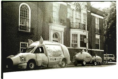 Members of TrueMajority parked their traveling parade on Mt. Auburn St. last week. The group, founded by Ben & Jerry's co-founder Ben Cohen, will travel cross-country in their unconventional vehicles.