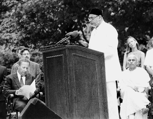 CYRUS R. MEHTA, of the Harvard Zoroastrian Association, delivers an address at the University’s Sept. 11 observance ceremony Wednesday. Religious leaders, students and University President LAWRENCE H. SUMMERS (L) addressed a crowd of thousands.