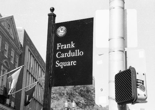 A newly displayed sign in Harvard Square honors the late Frank N. Cardullo, who worked in the area for nearly 50 years.