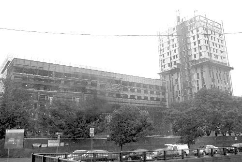 Construction on the University’s One Western Ave., a high-rise building in Allston, is slated to end this July. The apartment complex will add several hundred units to Harvard’s graduate student housing lottery.