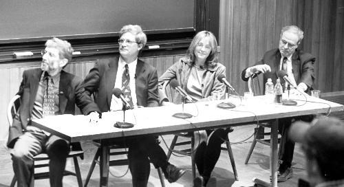 Professors DAVID PILBEAM, JAMES ENGELL, MARIA TATAR and JORGE DOMINGUEZ (left to right), wait to speak as part of a symposium on the Core Curriculum yesterday in Sever Hall.
