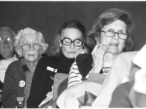 Residents gather at the Martin Luther King School in Cambridge last night to discuss strategies to fight Harvard growth.