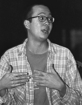JANSON WU, a pre-law tutor in Mather House, speaks at a discussion on tolerance last night.