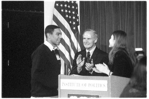 Attorney General of Massachusettes THOMAS REILLY, center, and PBHA President LAURA E. CLANCY ’02-’03, right, award the Donald W. Moreland Award for Public Service to SEBASTIAN L. FAIN ’03.
