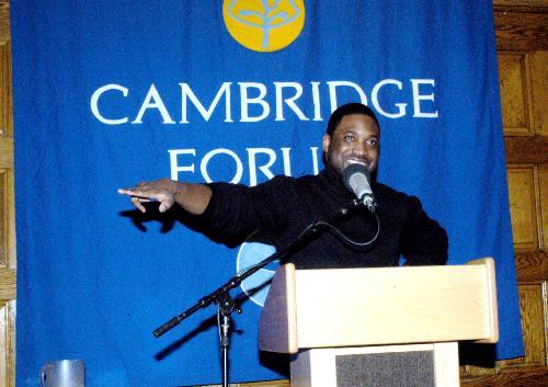 SELWYN SEYFU HINDS discusses his new book “Gunshots in my Cook-Up”  at a Cambridge Forum yesterday.