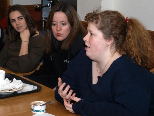 AMY E. KEEL '04 (r), ELEANOR J. HONIG '4 (c), and REBECCAH G. WATSON '04 (l) participate in an RUS discussion of the gender issues surrounding the recent erection of a snow phallus in Tercentenary Theater.