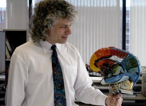 STEVEN PINKER, shown in his office at MIT, will join the psychology department next year. His most recent book, The Blank Slate, was a best-seller.