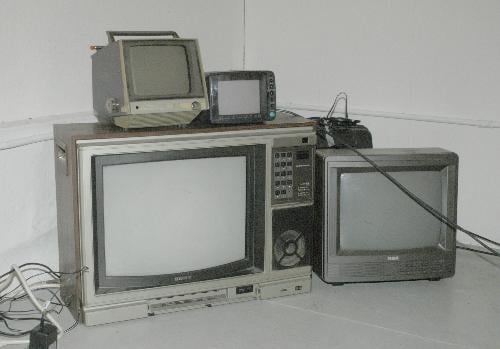 This display of television sets and other interactive installations offered onlookers an innovative forum for discussion on issues of war, displaying artists' creative responses to political challenges.