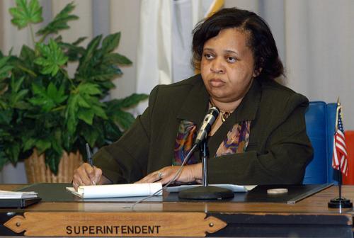 Acting Cambridge school superintendent CAROLYN TURK watches over a school board meeting yesterday to pick her replacement. 