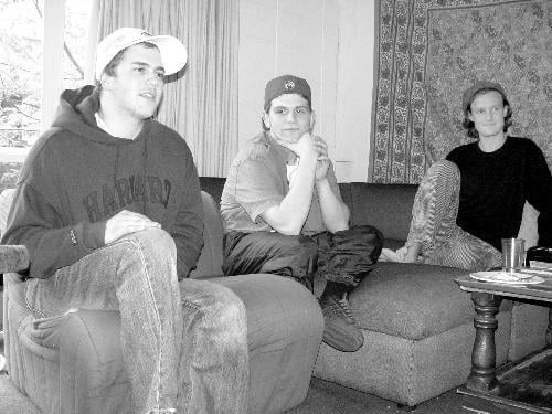 Quincy senior roommates SAMUEL GRAHAM-FELSEN ’03 (left), CHRISTOPHER ROMA-AGVANIAN ’02-’03 (center) and KIERAN FITZGERALD ’03 reflect on their years at Harvard.
