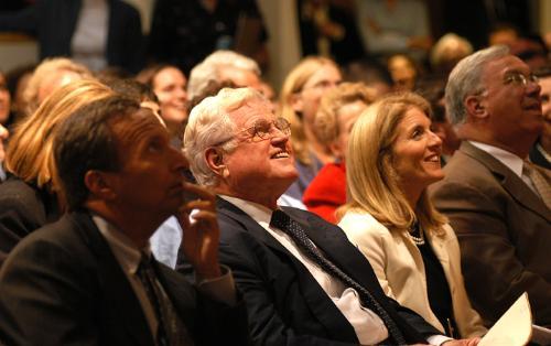 University President LAWRENCE H. SUMMERS, Senator EDWARD M. KENNEDY ’54-’56, CAROLINE KENNEDY and Boston Mayor THOMAS MENINO watch a film tribute Friday at the ARCO forum.