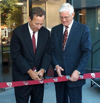 University President LAWRENCE H. SUMMERS (left) and Medical School Dean JOSEPH B. MARTIN cut a ribbon to mark the opening of the school’s New Research Building.