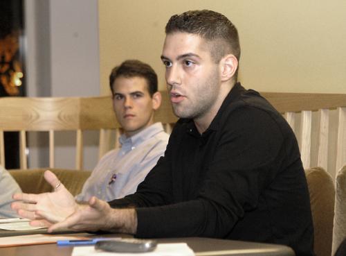 JORDAN B. WOODS '06, politcal chair of the BGLTSA, and MATTHEW D. MULLER, a Law School first-year, speak at a teach-in last night.