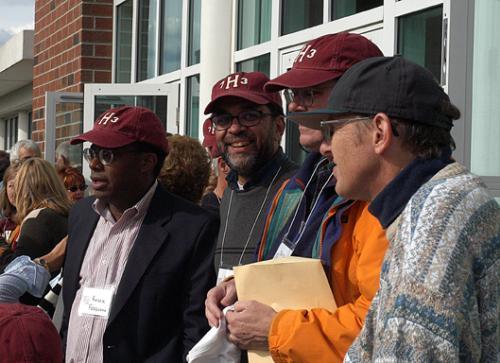 From left to right, TIM C. MAGUIRE '73, ROGER W. FERGUSON '73 and FRED V. BOYD '73 gather outside the Murr Center to watch the Harvard-Lafayette football game during their 30th reunion this weekend.