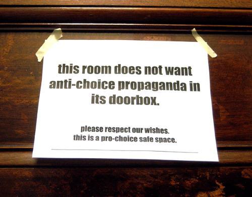 The residents of an Adams suite protested HRL doordropped literature by posting a sign distributed over e-mail by Harvard Students for Choice.