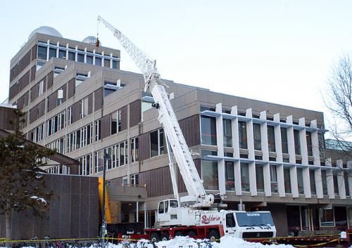 A crane sat in front of the Science Center yesterday as construction continued on the building. The renovations are expected to be finished next March, two months later than officials originally planned. 