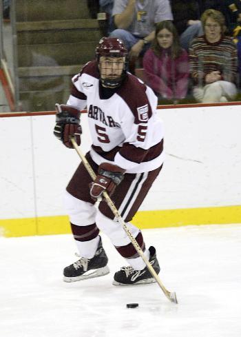 Junior defensemen NOAH WELCH, shown here in earlier action against Clarkson, leads Harvard’s defensemen with six points.