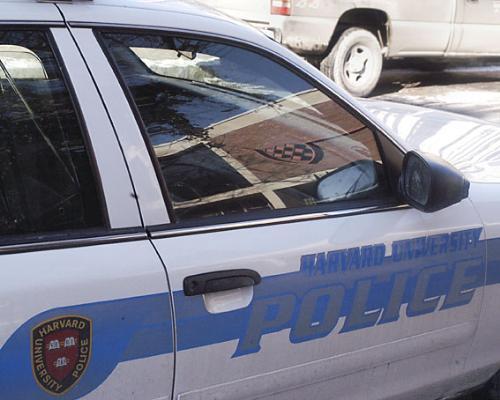 A Harvard University Police Department cruiser sits outside of Quincy House. An increased police presence is one of the steps HUPD has taken after another student was groped near campus this week.