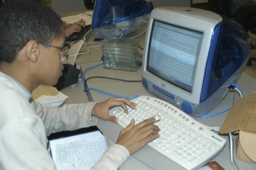 Sunday 3 p.m.—Staff writer Robin M. Peguero '07 types up his story.