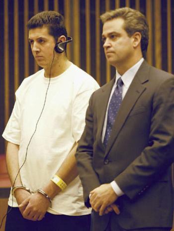 Geremias Cruz Ramos, left, appears in Middlesex District Court with his attorney Carlos Dominguez on Jan. 27 for a hearing to determine bail. One police officer said Ramos has confessed to many recent gropings.
