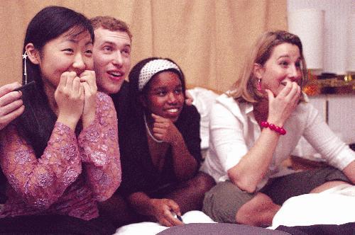 SungMi A. Choi ’06, left, Andrew C. Stillman ’06, Camille E. Powe ’06 and Kara A. Lyons ’04, dressed as their favorite “Sex and the City” characters, rented a room at the Charles Hotel last night to watch the final episode on HBO.