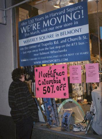 Brine’s Sporting Goods has posted signs announcing its move to Belmont on windows of the Harvard Square shop.