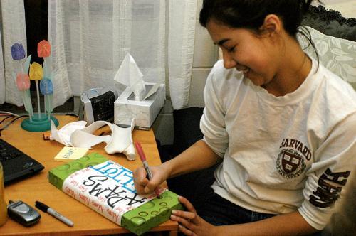 For the 2004 River Run, Stefanie L. Botelho '07 made a shoebox boat to launch on the Charles River with the names of her preferred River Houses, such as Adams, written on it.