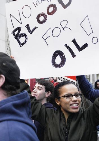 Several Harvard student groups protest against President Bush at a rally yesterday afternoon in Boston, where Bush was holding a fundraiser.