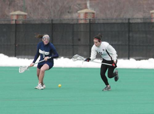 Harvard junior midfielder Elaine Belitsos, seen in earlier action, tallied five goals on seven shots in the women’s lacrosse team’s 15-7 win over the Lions on Saturday. Belitsos also scooped up three groundballs in the win.