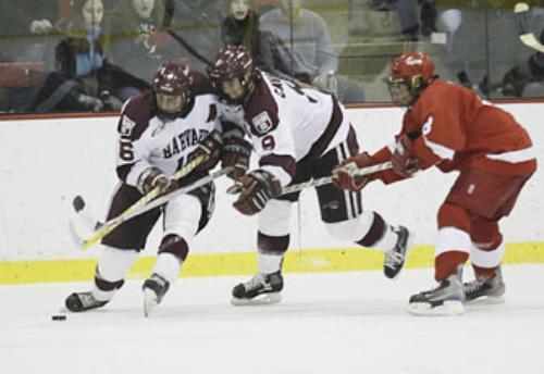 Senior Tyler Kolarik (16) and junior Tom Cavanagh (9) were two of the Crimson's most clutch players during the team's run through the ECAC Tournament.