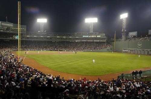 Hundreds of Harvard seniors cheer for the Boston Red Sox at Fenway Park. Seniors lotteried for coveted tickets to the May 27 game via e-mail. After a brief rain delay, the Red Sox beat the Seattle Mariners, 8-4