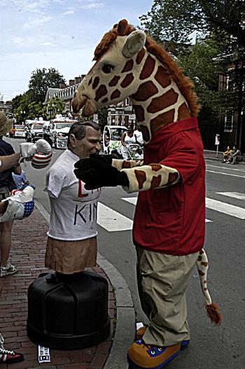 Anti-Bush protesters get ready for the convention with a parade down Mass. Ave. in Harvard Square.