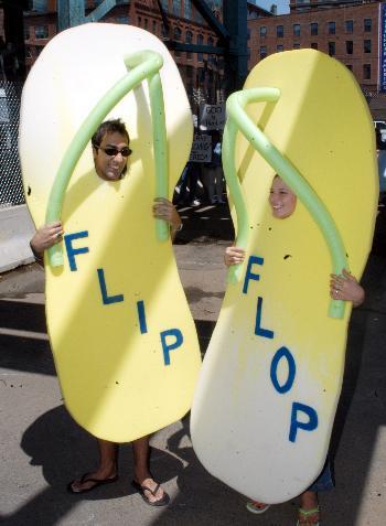 Two Republican protestors outside the FleetCenter on Monday attacked Sen. John F. Kerry, D-Mass., for his record of waffling on major issues. 