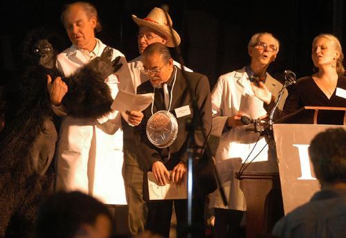 Daisuke Inoue of Hyago,  Japan, winner of an Ig Noble prize, is serenaded by a pack of Nobel Laureates, singing “It’s just too good to be true.”