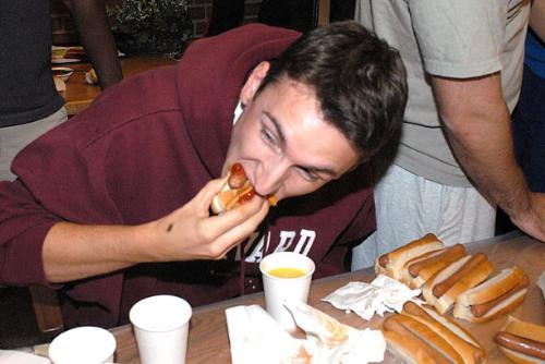 John T. Oxtoby ’07 chows down in a hot dog eating contest last night in Mather House as part of the ongoing Louie Cup, an intrahouse olympiad with weekly events in honor of the proprietor of the local convenience store.