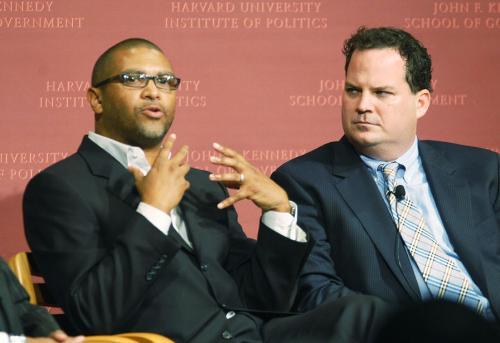 Reginald Hudlin, left, discusses his latest book, a social satire, entitled Birth of  A Nation: A Comic Novel at the John F. Kennedy, Jr. Forum last night.