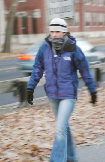 Students bundled up on campus yesterday as temperatures dropped to below freezing with wind chill.