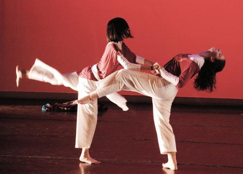 Left to right, Gabriela Pena ’08 and Anna C. Walters ’06 perform in the dance “Renacer,” part of Harvard Radcliffe Dance Company’s Me in a Box.