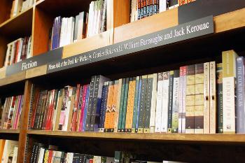 A sign at Harvard Book Store directs readers to ask the front desk for works by Jack Kerouac, Charles Bukowski and William S. Burroughs, whose books have been disappearing from the shelves.