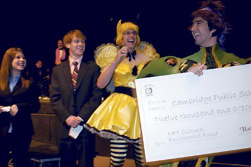Hasty Pudding Theatrical members Charles E. Worthington ‘06, John P. Blickstead ’06 and Samuel G. Rosen ’06, left to right, present a donation last night to go toward funding arts programs at Cambridge Public Schools.
